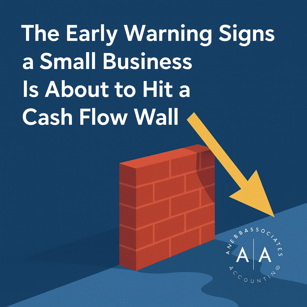 Early warning signs a small business is about to hit a cash flow wall, illustrated with declining arrow and brick wall